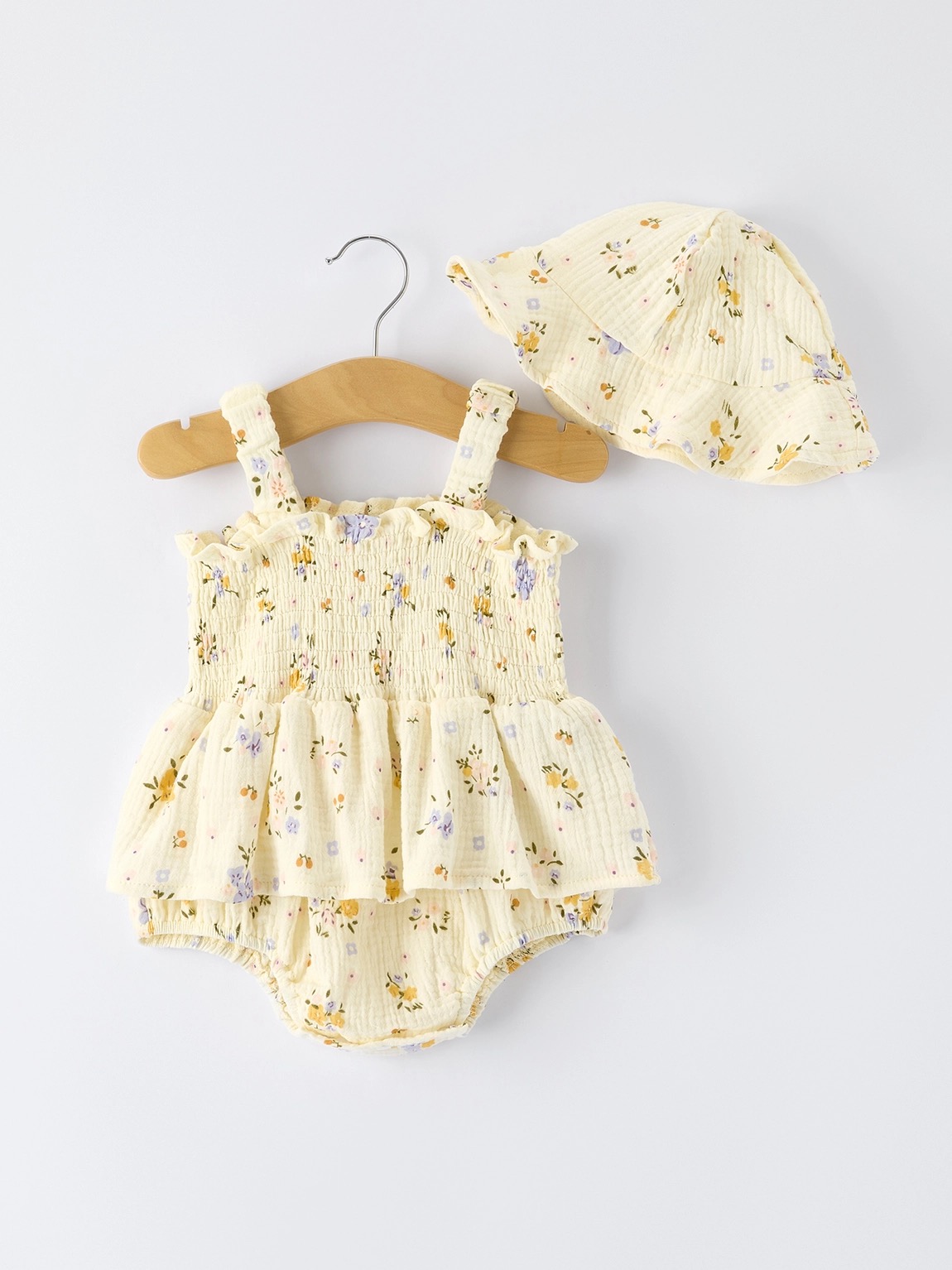 Baby floral muslin romper at Winged Star Boutique